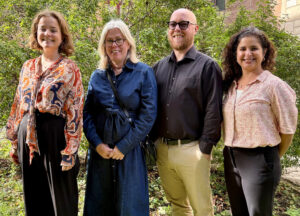 Gruppbild med fyra glada personer